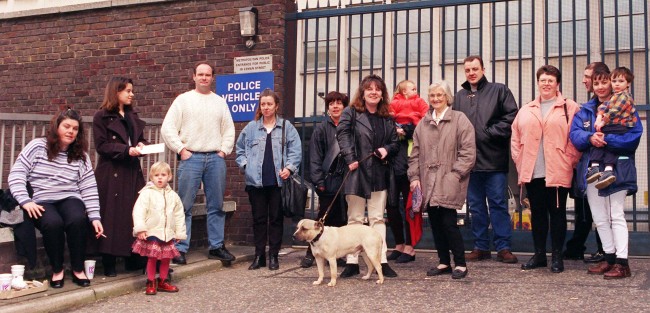 Protesters gather outside Leman St Police Station in London this afternoon (Tuesday) where recently released paedophile Sidney Cooke is believed to be taking refuge. PA Photos. Ref #: PA.1087579  Date: 07/04/1998 