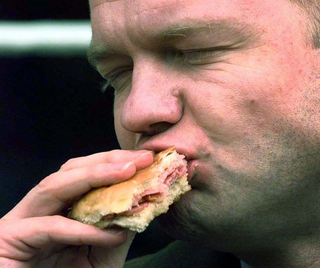 Conservative Party Leader William Hague eats a bacon sandwich as he promotes British pork in the Richmond market place, North York. He revealed that he enjoys bacon for breakfast every day .  Ref #: PA.1169628  Date: 05/03/1999