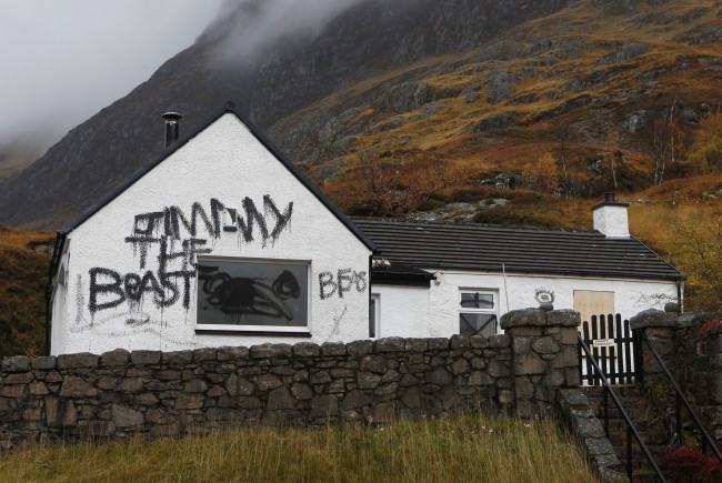 Slogans painted on the cottage owned by Jimmy Savile in Glencoe, Scotland.