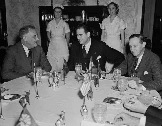 In this Dec. 5, 1939 file photo, President Franklin Roosevelt, left, talks to South Carolina Governor Olin Johnston at a breakfast in the mansion at Columbia, S.C. Leaving a judge to decide whether to throw out the conviction of 14-year-old George Stinney, who was executed in South Carolina in 1944, reminds his supporters of how the teen's fate was also in Johnston's hands nearly 70 years ago. Stinney's conviction is being challenged by a lawsuit filed by supporters asking for a new trial, a move unprecedented in South Carolina for someone already put to death. A hearing has been scheduled for Jan. 21, 2014. (AP File Photo)