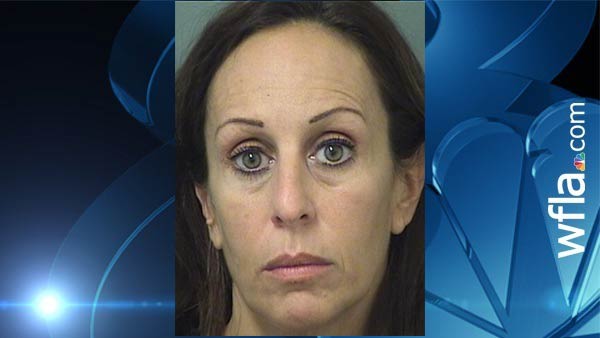 Krista Morton, 45, is charged with possession of marijuana. She's the principal at Mavericks High School. The student in the car is a senior at the Palm Springs school.  North Palm Beach Police were called to a parking lot Wednesday around 5:45 p.m. “The caller was unsure but thought that there were people in the back seat engaged in some sort of sexual activity or being attacked,” police said.  When a sergeant knocked on the door, Morton, who has wings tattooed on her lower back, opened it and immediately said, “We're just friends,” according to police. Morton's shirt was unbuttoned, exposing her shoulders and part of her chest, the police department said.  Morton told police she didn't know the male in the car. “She continued to tell me that she had just met him, that she was lonely, she had just picked him up down the street and brought him here to get to know him,” police said.  But, the student, who is 18 years old, admitted she was his principal.  Police could smell “the odor of fresh burnt marijuana coming from inside the vehicle,” the arrest report says. Morton didn't admit to smoking but did say marijuana was smoked in the car. Police found a bag with marijuana, a lighter and rolling papers pushed underneath the back side of the passenger seat. The student also had a grinder, additional lighters and a small screwdriver.  Both Morton and the student were arrested.