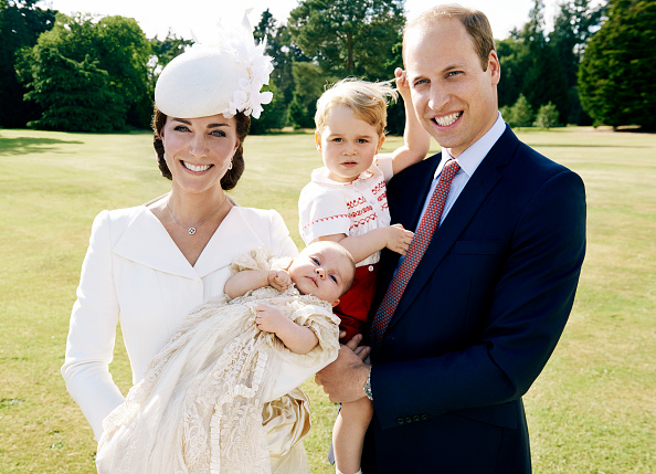 KING'S LYNN, ENGLAND - JULY 05: (EDITORIAL USE ONLY)   In this handout image supplied by Mario Testino/ Art Partner,  Catherine, Duchess of Cambridge, Prince William, Duke of Cambridge and their children Princess Charlotte of Cambridge and Prince George of Cambridge pose for a photo after the christening of Princess Charlotte of Cambridge at the Sandringham Estate on July 5, 2015 in King's Lynn, England. (Photo by Mario Testino/ Art Partner via Getty Images)  ***Terms of release, which must be included and passed-on to anyone to whom this image is supplied: USE AFTER 10/10/2015 must be cleared by Art Partner. This photograph is for editorial use only. NO commercial use. NO use in calendars, books or supplements. Use on a cover, or for any other purpose, will require approval from Art Partner and the Kensington Palace Press Office. There is no charge for the supply, release or publication of this official photograph. This photograph must not be digitally enhanced, manipulated or modified and must be used substantially uncropped. Picture must be credited: copyright Mario Testino /Art Partner.***