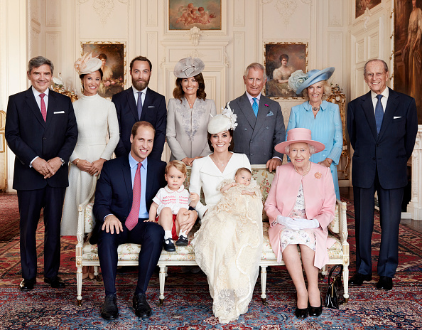 KING'S LYNN, ENGLAND - JULY 05: (EDITORIAL USE ONLY)   In this handout image supplied by Mario Testino/ Art Partner,   Prince William, Duke of Cambridge, Prince George of Cambridge, Catherine, Duchess of Cambridge, Princess Charlotte of Cambridge and and Queen Elizabeth II pose in front of (L-R) Michael Middleton, Pippa Middleton, James Middleton, Carole Middleton, Prince Charles, Prince of Wales, Camilla, Duchess of Cornwall and the Duke of Edinburgh pose for a family photo after the christening of Princess Charlotte of Cambridge at the Sandringham Estate on July 5, 2015 in King's Lynn, England. (Photo by Mario Testino/ Art Partner via Getty Images)  ***Terms of release, which must be included and passed-on to anyone to whom this image is supplied: For use in perpetuity in UK and Realm Nations. USE AFTER 10/10/2015 elsewhere must be cleared by Art Partner. This photograph is for editorial use only. NO commercial use.  NO use in calendars, books or supplements. Use on a cover, or for any other purpose, will require approval from Art Partner and the Kensington Palace Press Office. There is no charge for the supply, release or publication of this official photograph. This photograph must not be digitally enhanced, manipulated or modified and must be used substantially uncropped. Picture must be credited: copyright Mario Testino /Art Partner***