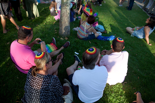 JERUSALEM, ISRAEL - JULY 30:  Israelis wearing Jewish Skull Caps participate in the Gay Pride Parade on July 30, 2015 in Jerusalem, Israel. At least six people were stabbed at Jerusalem's annual Gay Pride Parade on Thursday. The assailant, an ultra-Orthodox Jew, emerged behind the marchers and began stabbing them while screaming. A police officer then managed to tackle him to the ground and arrest him.  (Photo by Lior Mizrahi/Getty Images)