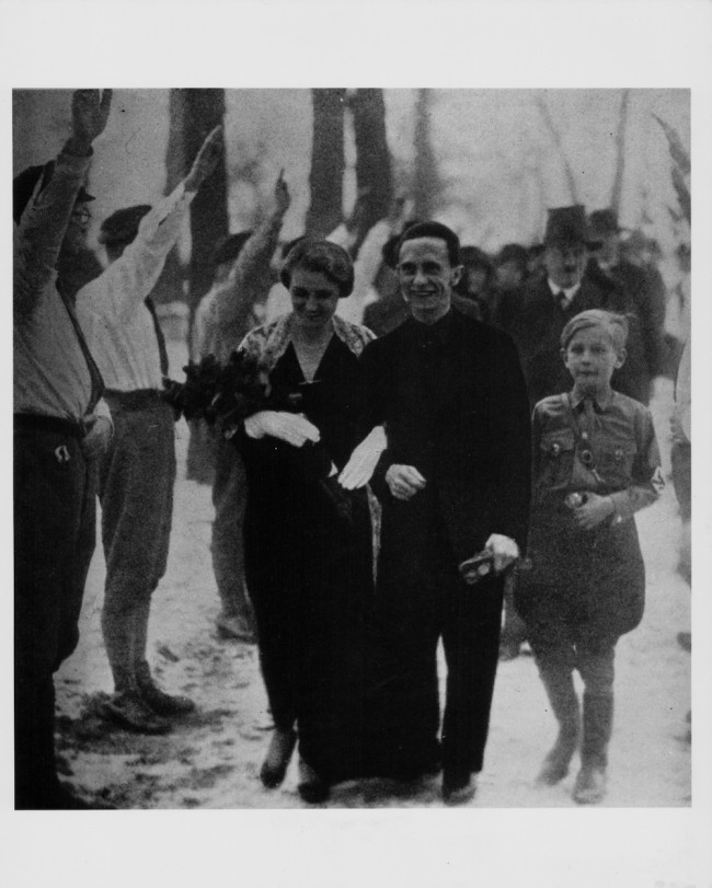 The wedding of Dr Joseph Goebbels, Reich Minister of Propaganda for the Nazi Party, with Adolf Hitler in the background, 1931. (Photo by Keystone/Hulton Archive/Getty Images)