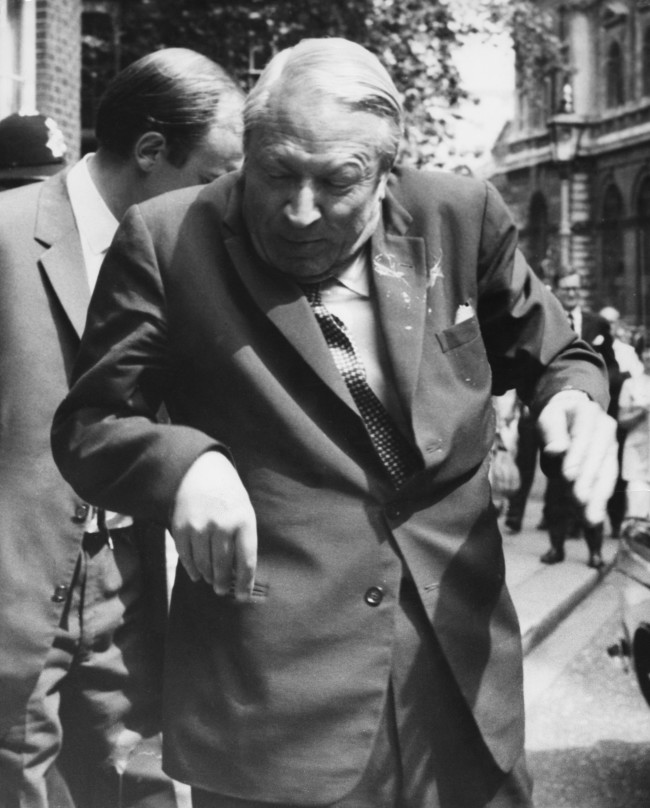 The new British Prime Minister Edward Heath (1916 - 2005) is splattered with red paint as he returns to Downing Street after lunch at the St James' Club, 20th June 1970. The paint was thrown by a woman, who was quickly arrested. (Photo by Keystone/Hulton Archive/Getty Images)
