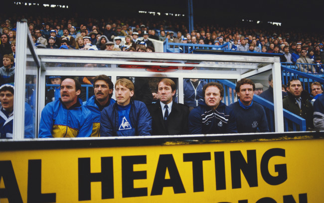 SHEFFIELD, UNITED KINGDOM - MAY 04: Everton substitute Alan Harper (3rd left) manager Howard Kendall (3rd right) and assistant Colin Harvey (r) look on during a 1-0 Everton victory against Sheffield Wednesday in a League Division one match at Hillsbrough on May 4, 1985 in Sheffield, England. (Photo by Allsport/Getty Images)