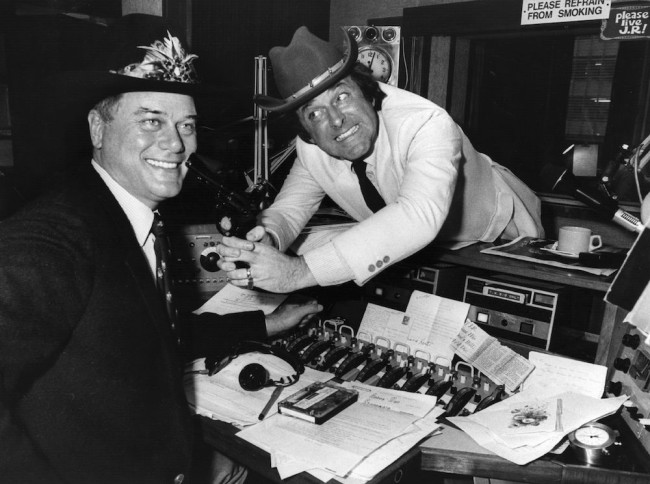 Irish television chat show celebrity and radio broadcaster Terry Wogan with American soap star Larry Hagman, who plays JR in 'Dallas'. At the time, 'Who Shot JR?' was the burning question on the lips of a nation of soap addicts, and Wogan is eagerly exploiting the photo-opportunity on his radio show.  Original Publication: People Disc - HP0168   (Photo by Tony Weaver/Getty Images)