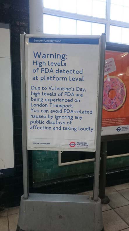 Train station poster alerts commuters to vomit inducing Valentine's Day