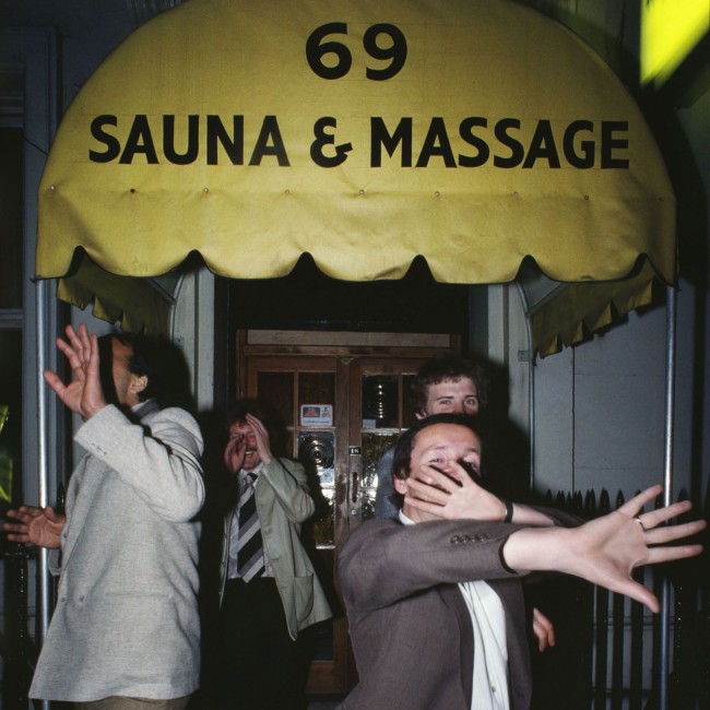 William Klein Men hidden their faces : 69 Sauna & Massage © William Klein